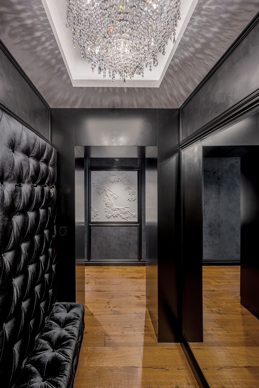 The contemporary beige interior with a bold black wardrobe 3 iceberg marek hinke architect 3 scaled manooi