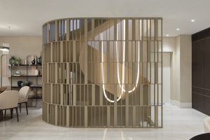 Luxury onyx staircase chandelier by Manooi in a high-end penthouse interior – bespoke architectural lighting for the USA market
