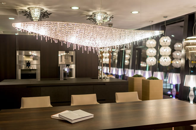 ago-einrichtung-showroom-austria-vague-luxury-chandelier-20th-annivesary Modern luxury showroom with a stunning Manooi crystal chandelier, Vague.