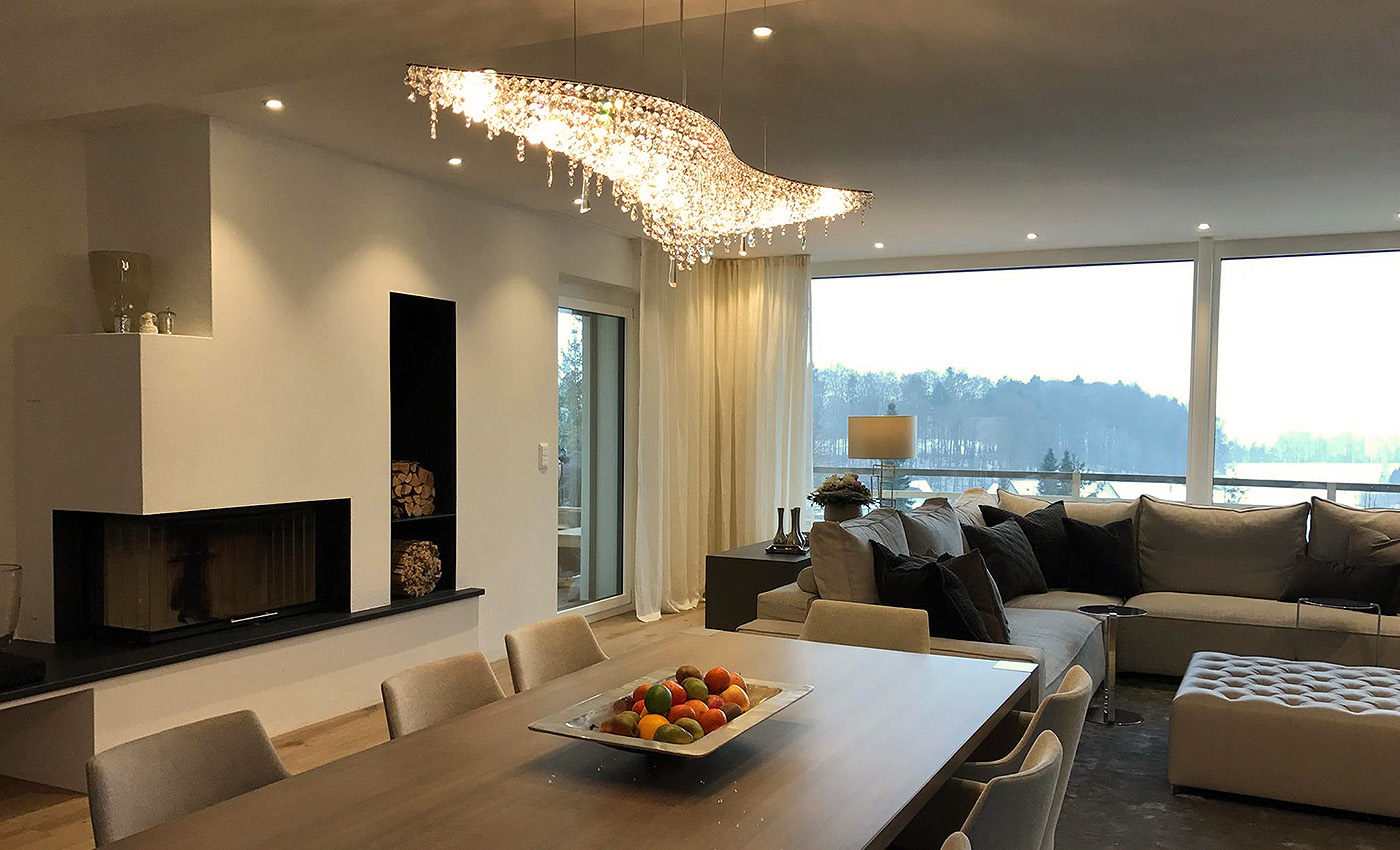 Vague luxury chandelier from Manooi in a living room in Switzerland.