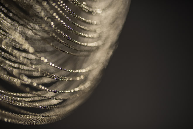 A detailed photo of the crystal sparkle of the Voile D luxury chandelier.
